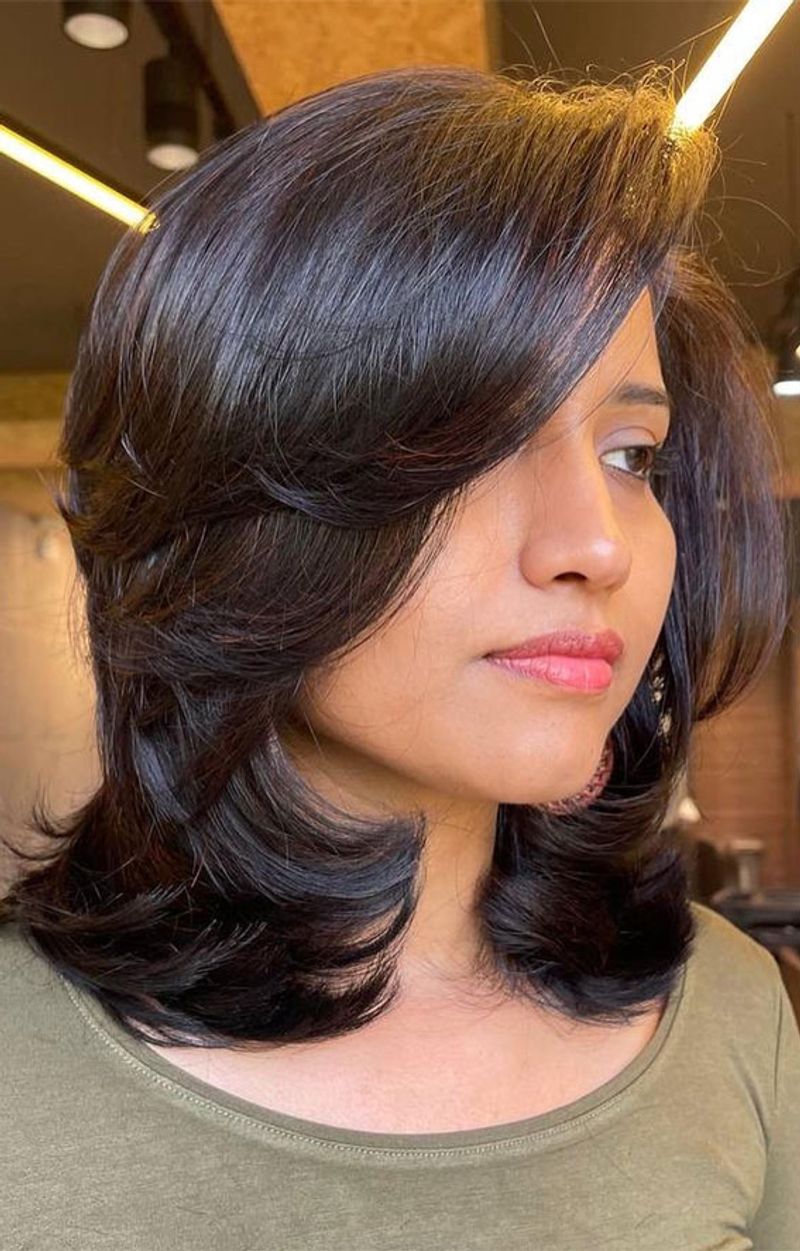 Layered Cut with Side-Swept Bangs