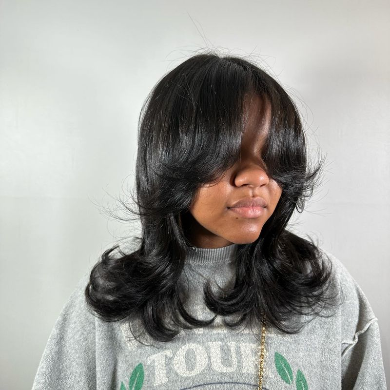 Feathered Layers with Curtain Bangs