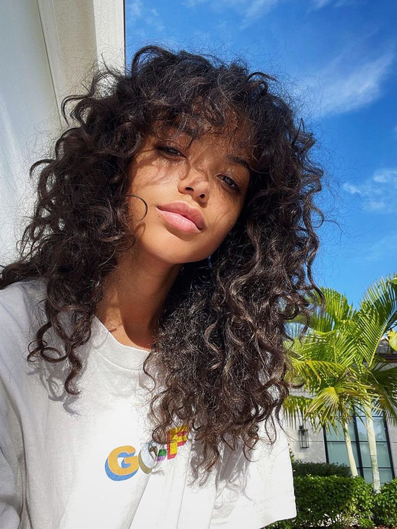 Curly Shag With Curtain Bangs