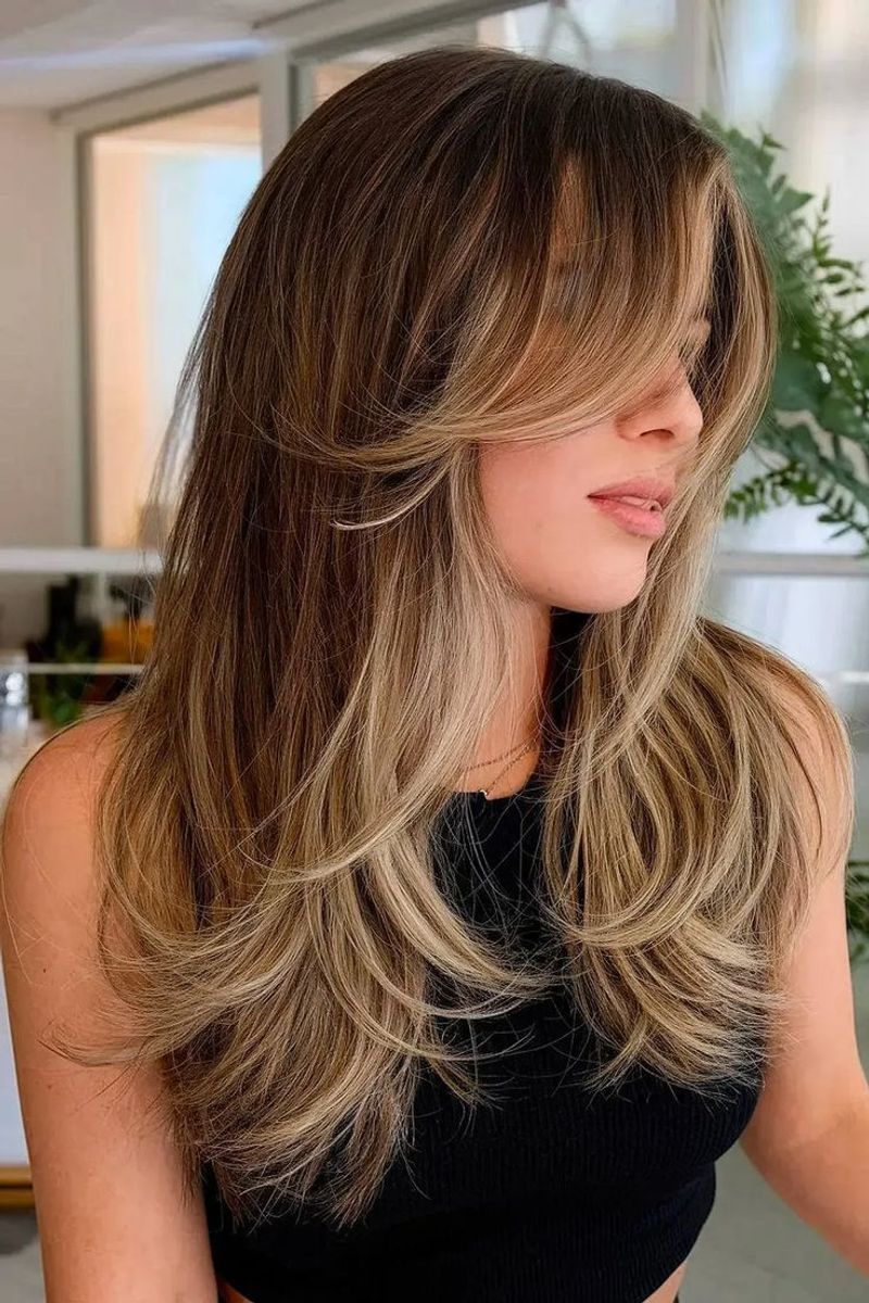 Butterfly Cut with Face-Framing Highlights