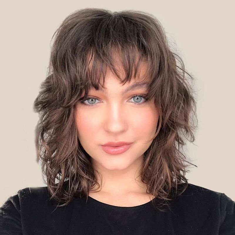 Layered Mid-Length with Curved Bangs