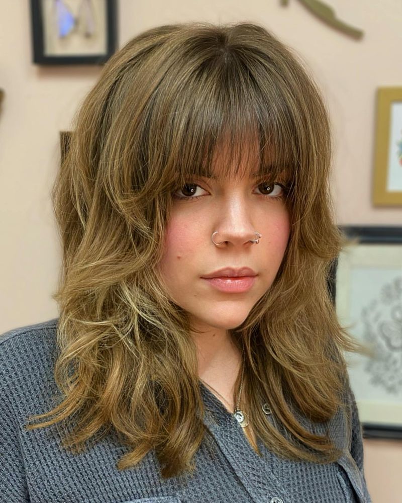 Shoulder-Length Waves With Wispy Fringe