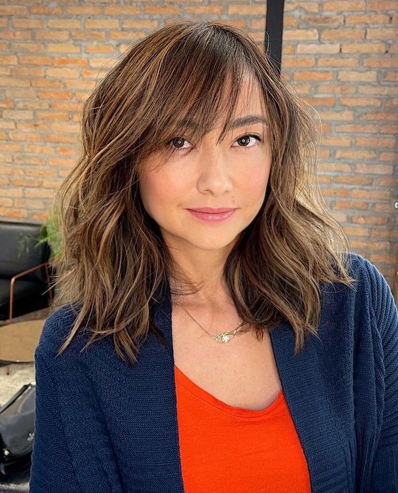 Mid-Length Cut with Soft Fringe