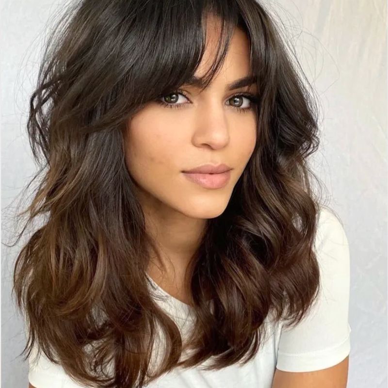 Voluminous Blowout with Curtain Bangs