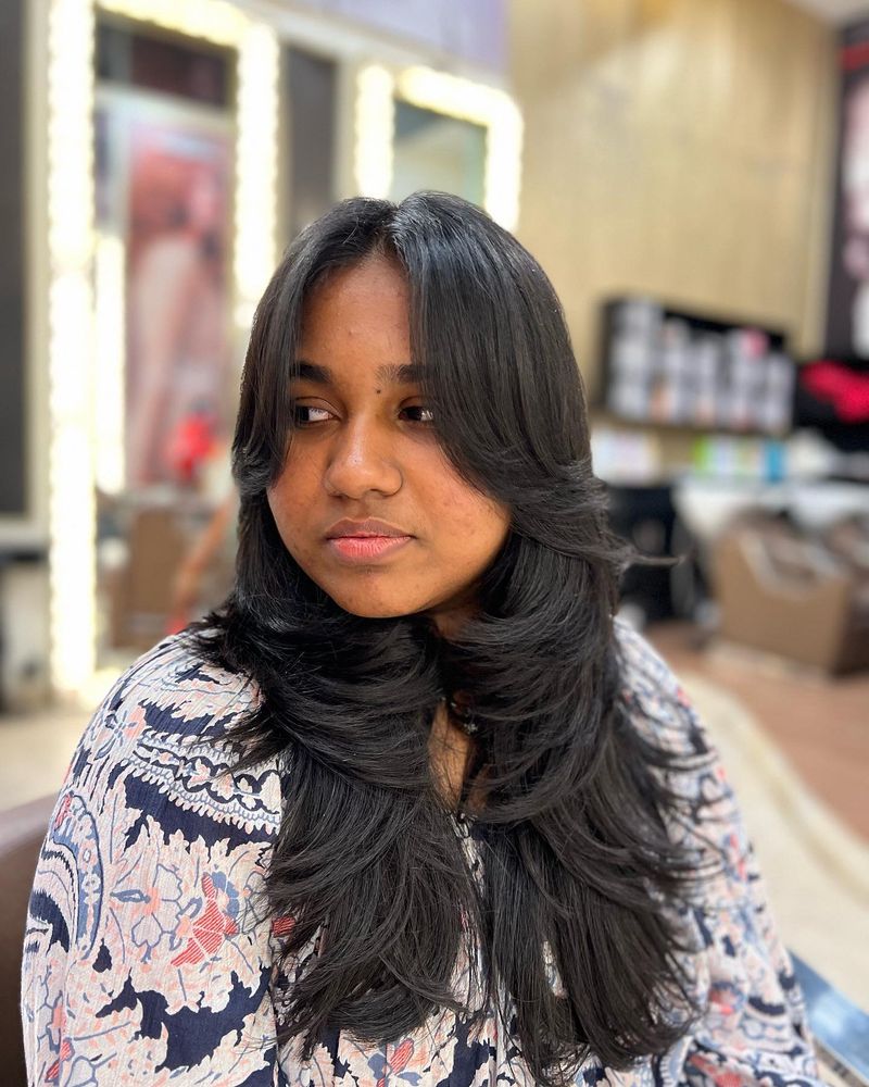 Face-Framing Layers with Long Curtain Bangs
