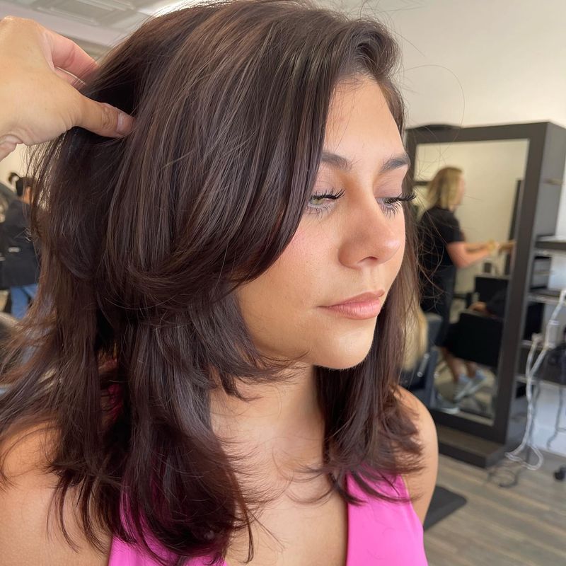 90s-Inspired Layers with Curtain Bangs