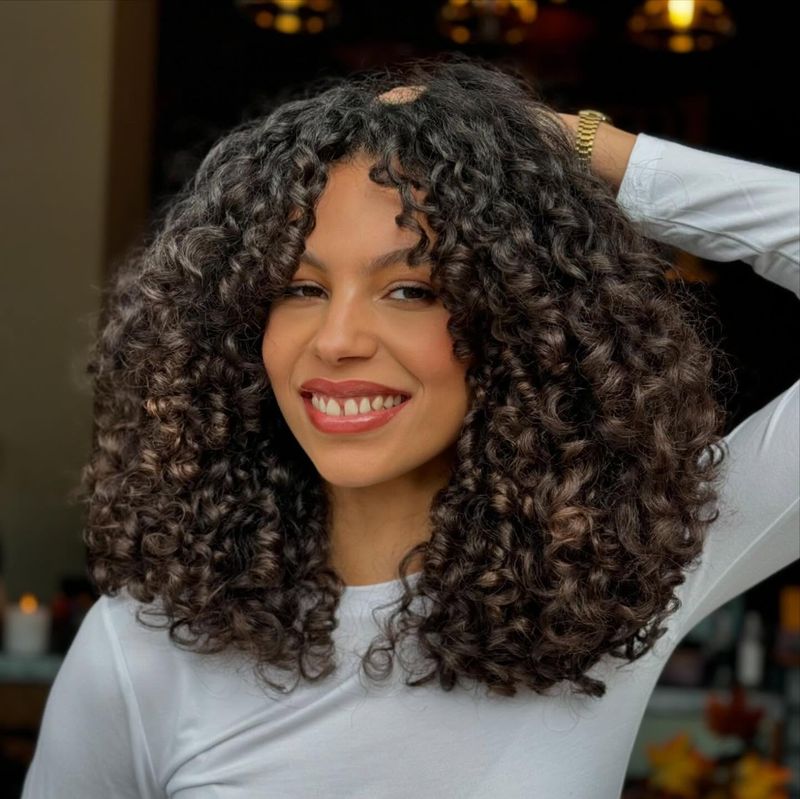 Curly Layered Cut with Side Part