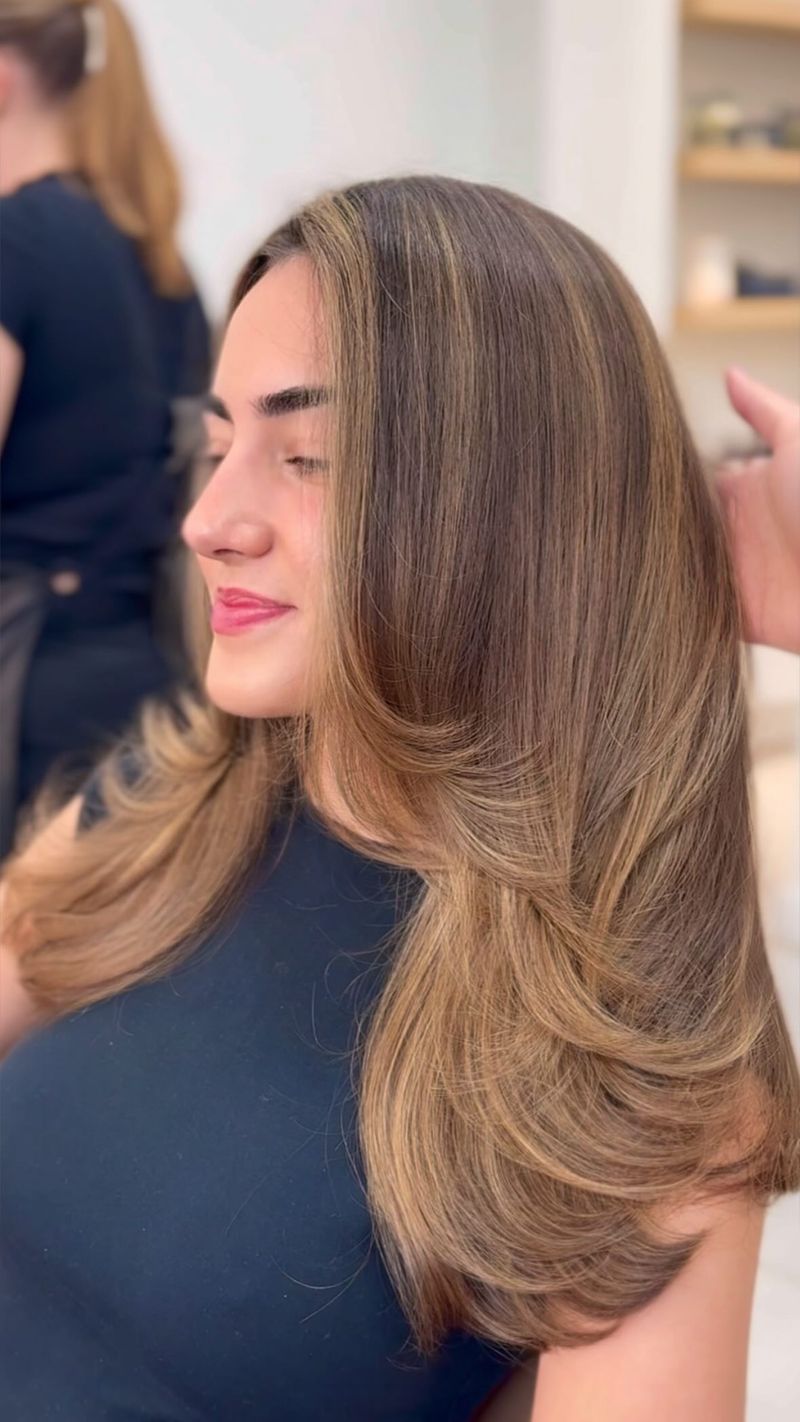 Corte comprido em camadas com franja lateral