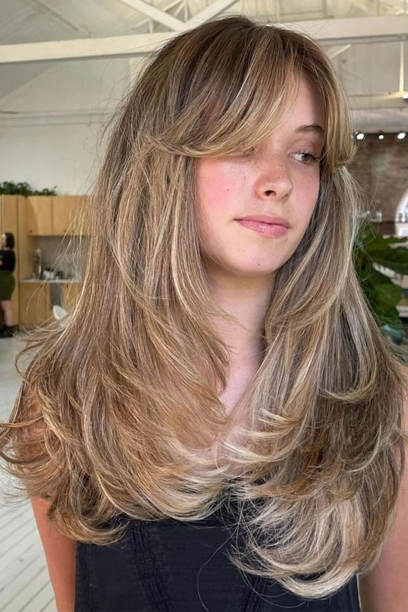 Curtain Bangs + Feathered Layers