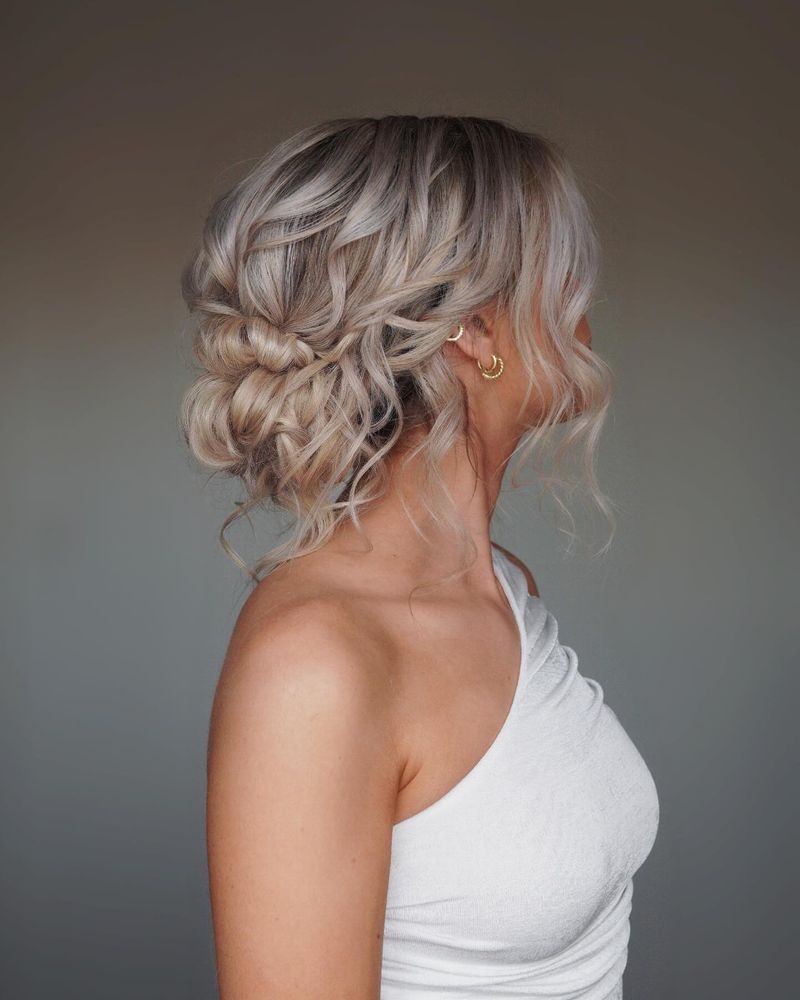Messy Bun with Face-Framing Tendrils