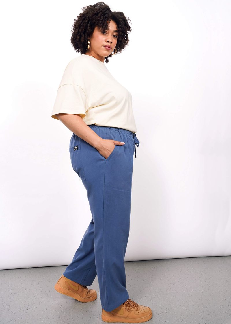 Overly Permed Hair With Elastic-Waist Pants