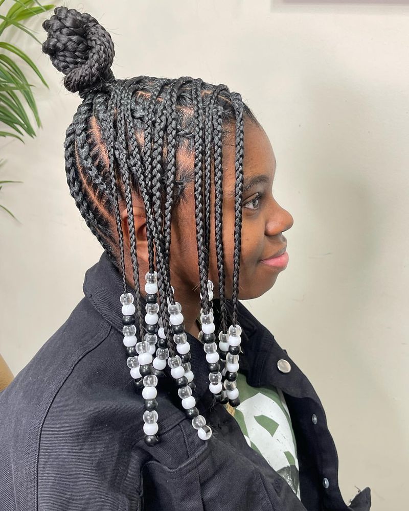 Box Braids met Top Knot