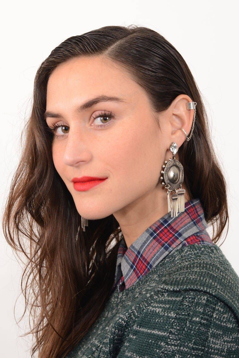 Slicked-Back Style for Grown-Out Roots