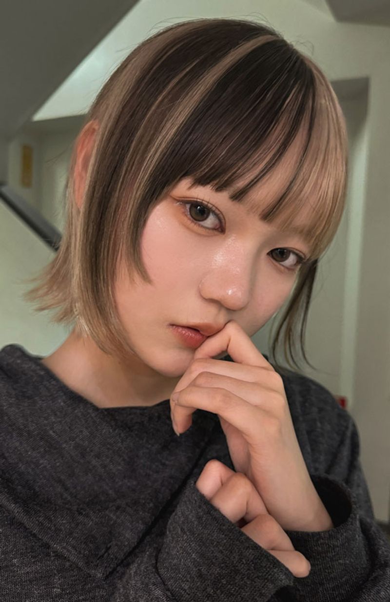 Overly Thinned Bob with Wispy Split Bangs