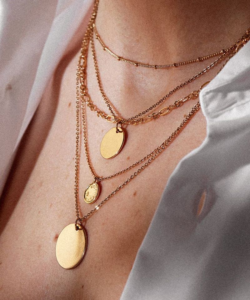 Bib Necklaces Create Visual Weight