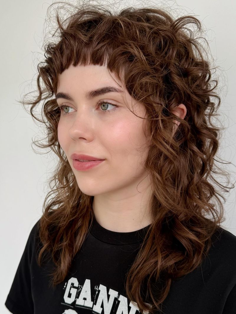 Curly Layered Crop with Arched Bangs