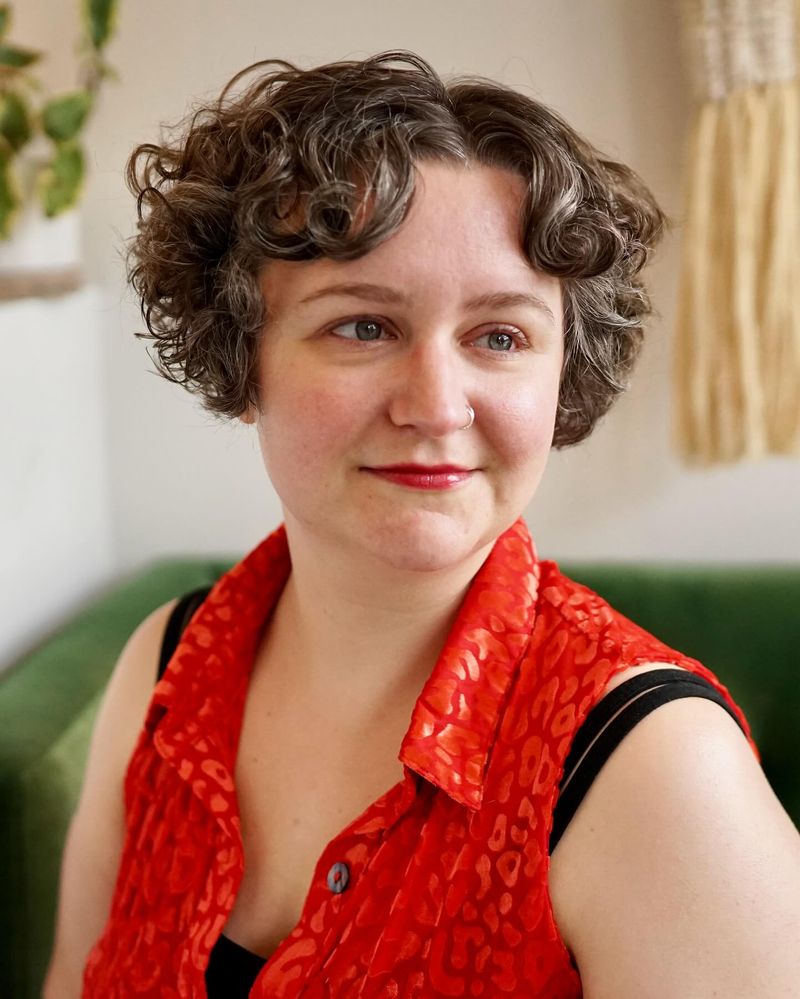 Vintage-Inspired Curly Bob with Blunt Bangs