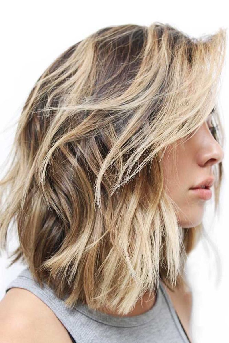 Shoulder-Length Cut with Deep Side Part