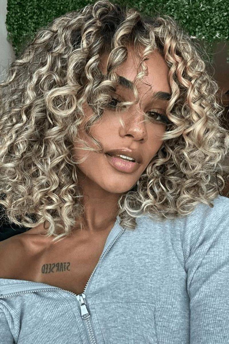 Elegant Curly Bob with Highlights