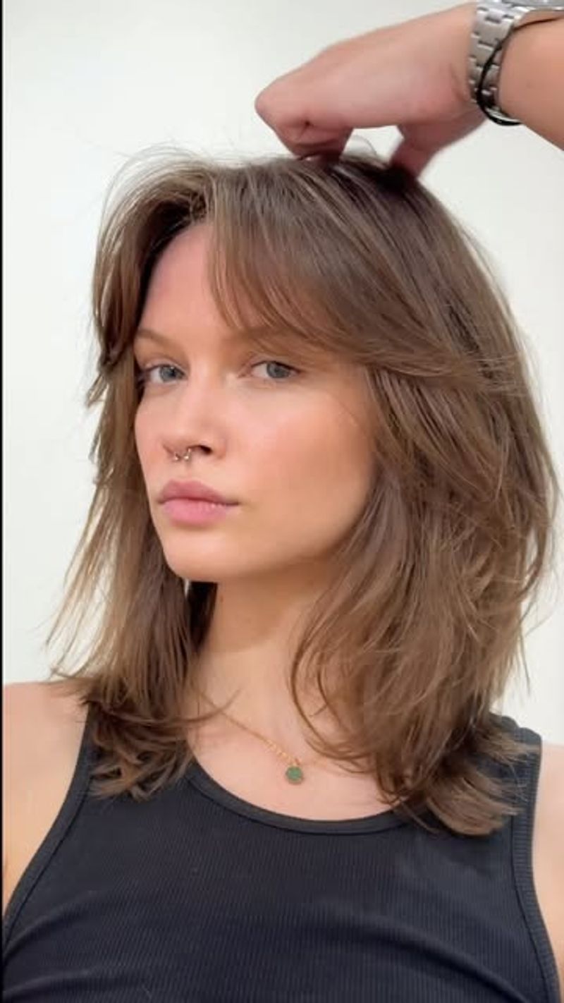 Shaggy Mid-Length Cut with Bangs