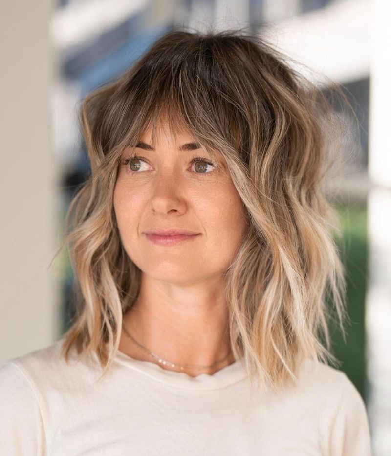 Asymmetrical Bangs with Beachy Texture