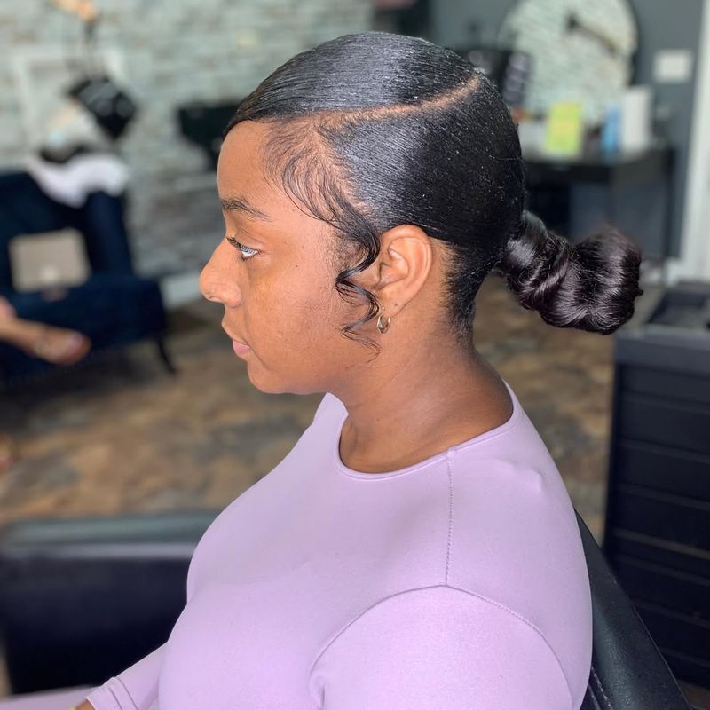 Sleek Low Bun with Side Part