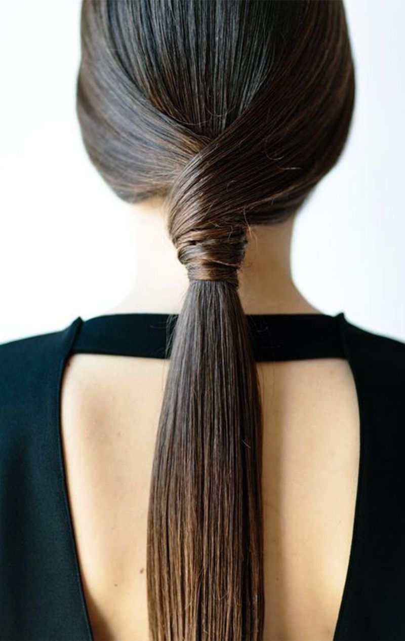 Sleek Low Ponytail with a Twist