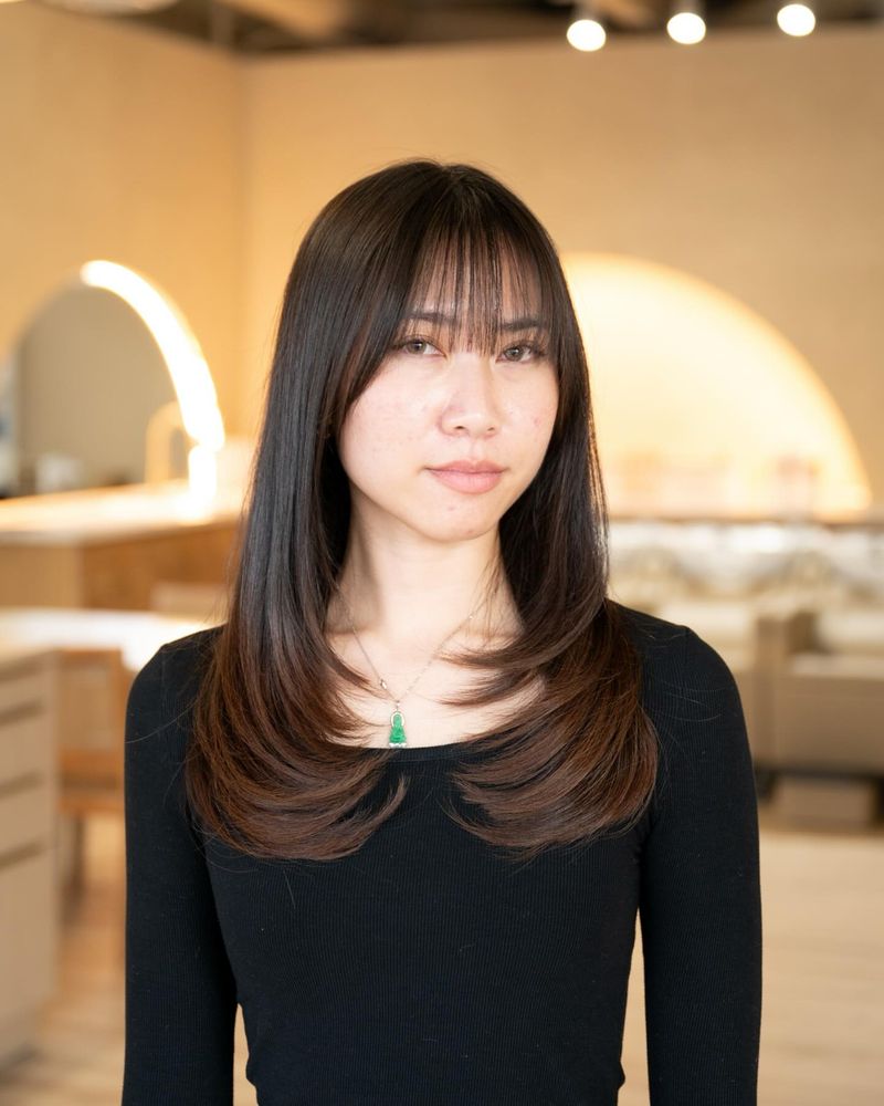 Diagonal Heavy Bangs