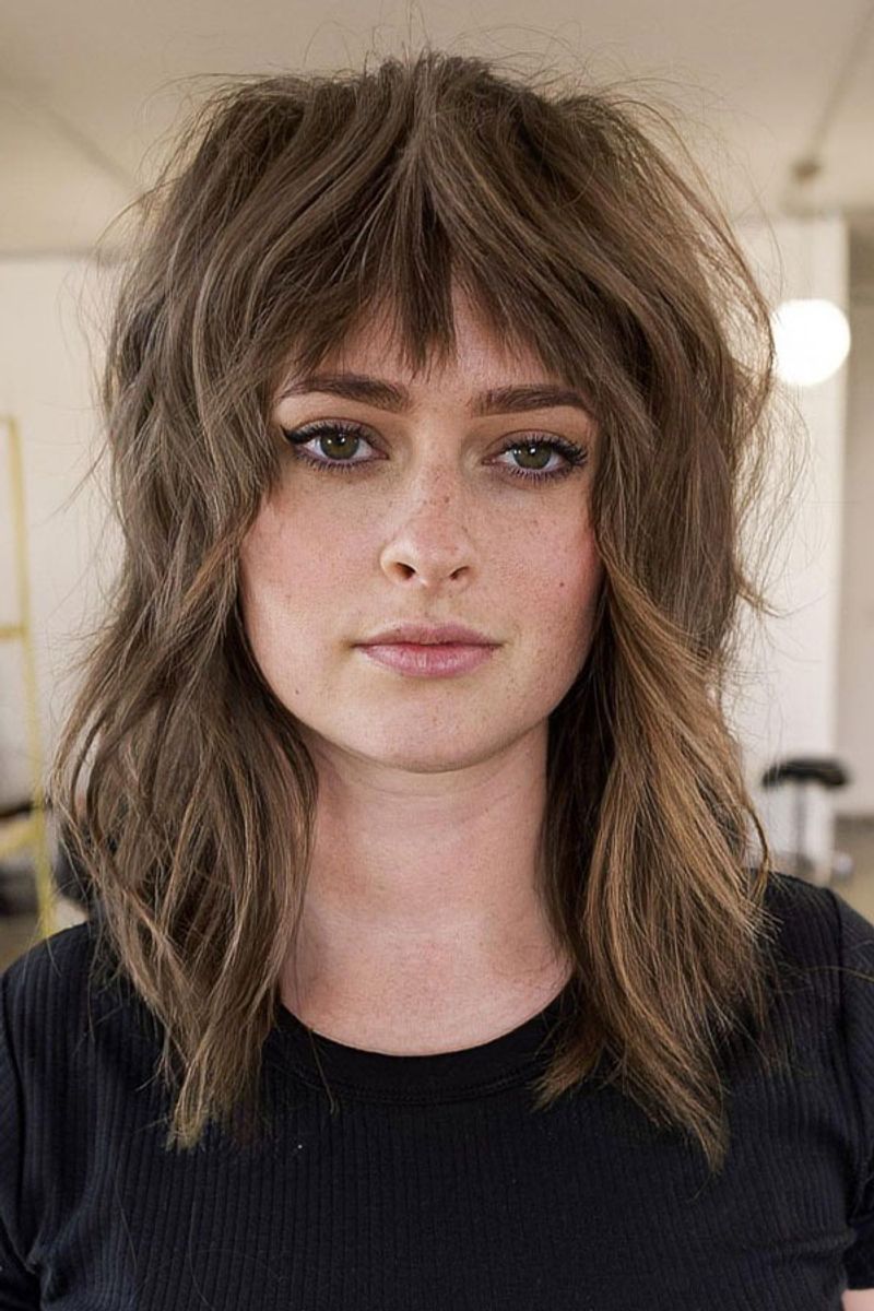 Shaggy Mid-Length Cut with Wispy Bangs