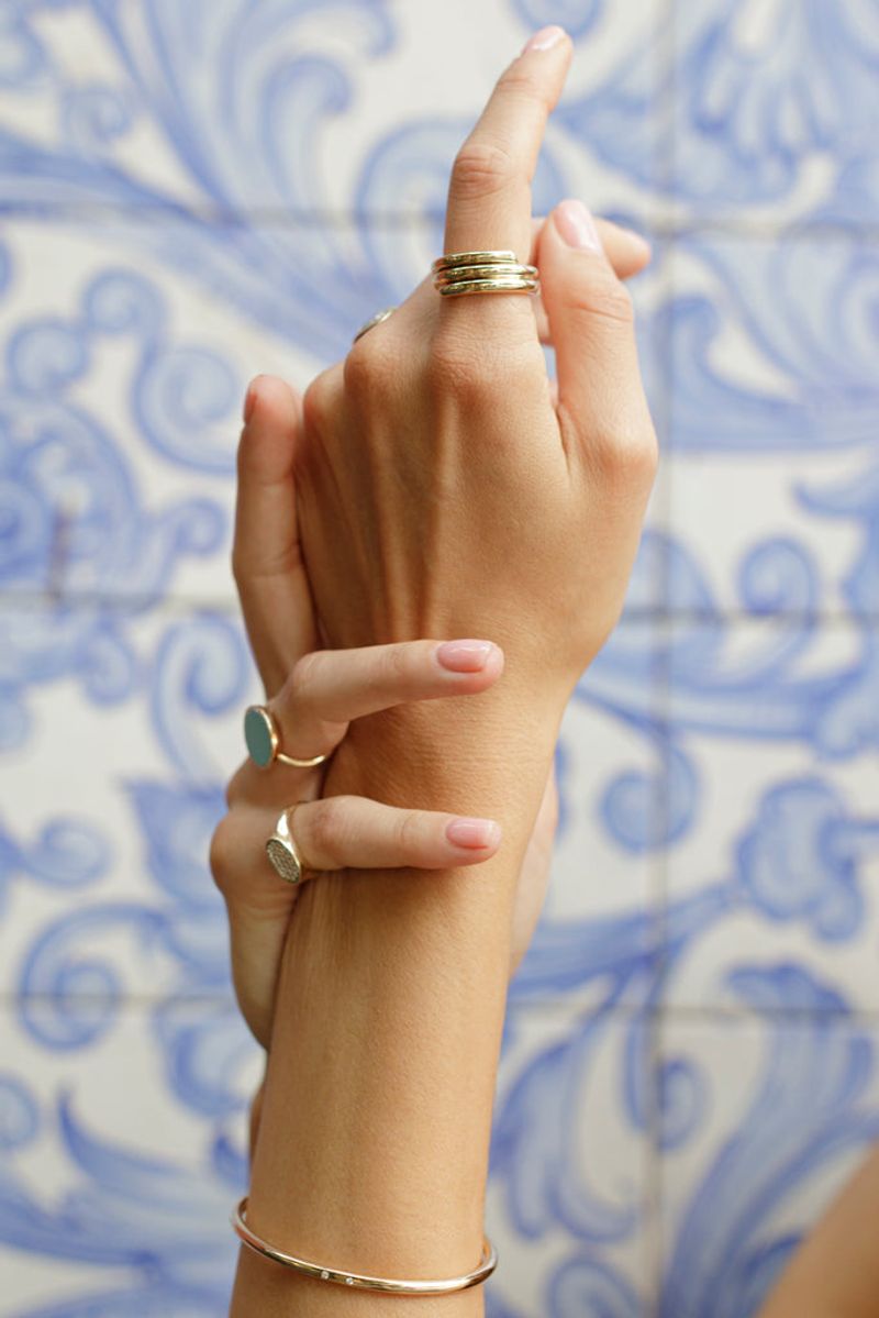 Statement Rings Pull Focus Downward