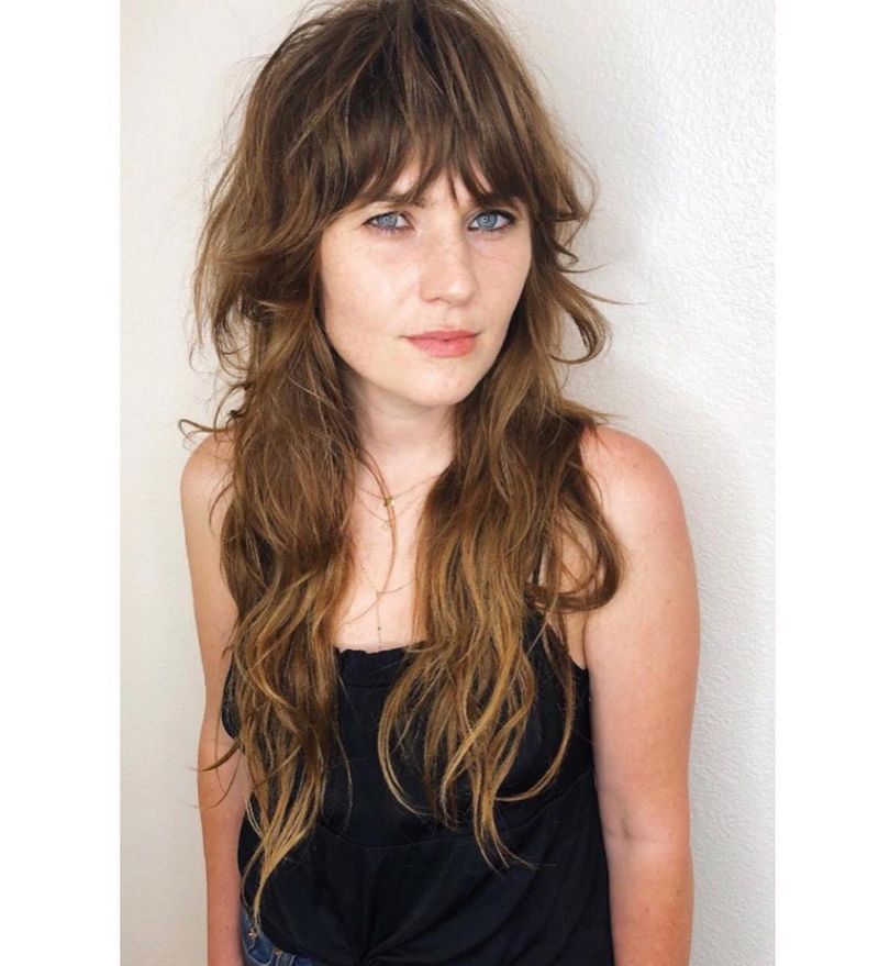 Layered Mermaid Cut with Swoopy Bangs
