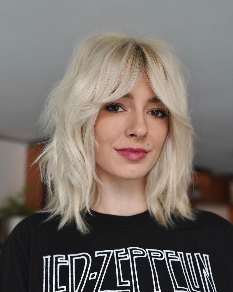 Shoulder-Length Shag with Curtain Bangs