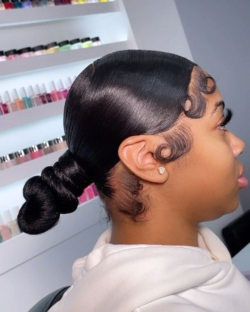 Sleek Middle-Part Bun with Baby Hairs