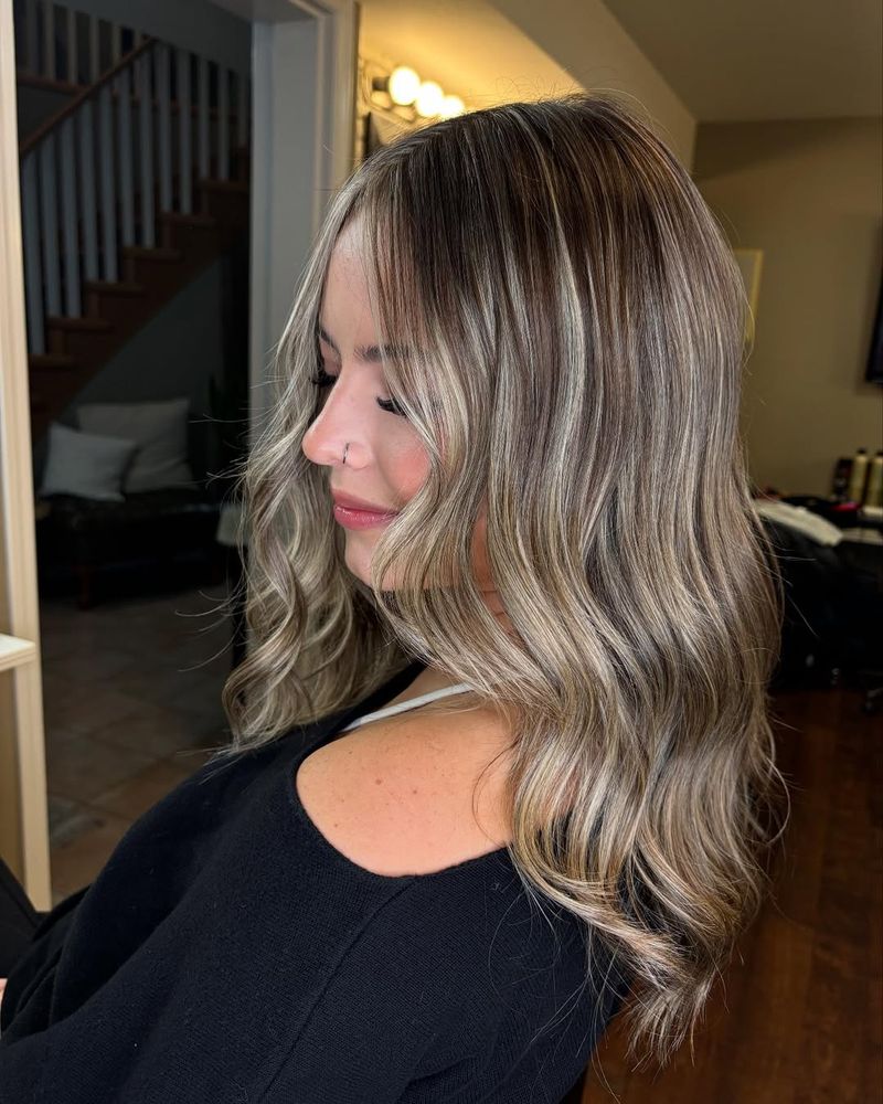 Long Layered Cut with Money Piece Highlights