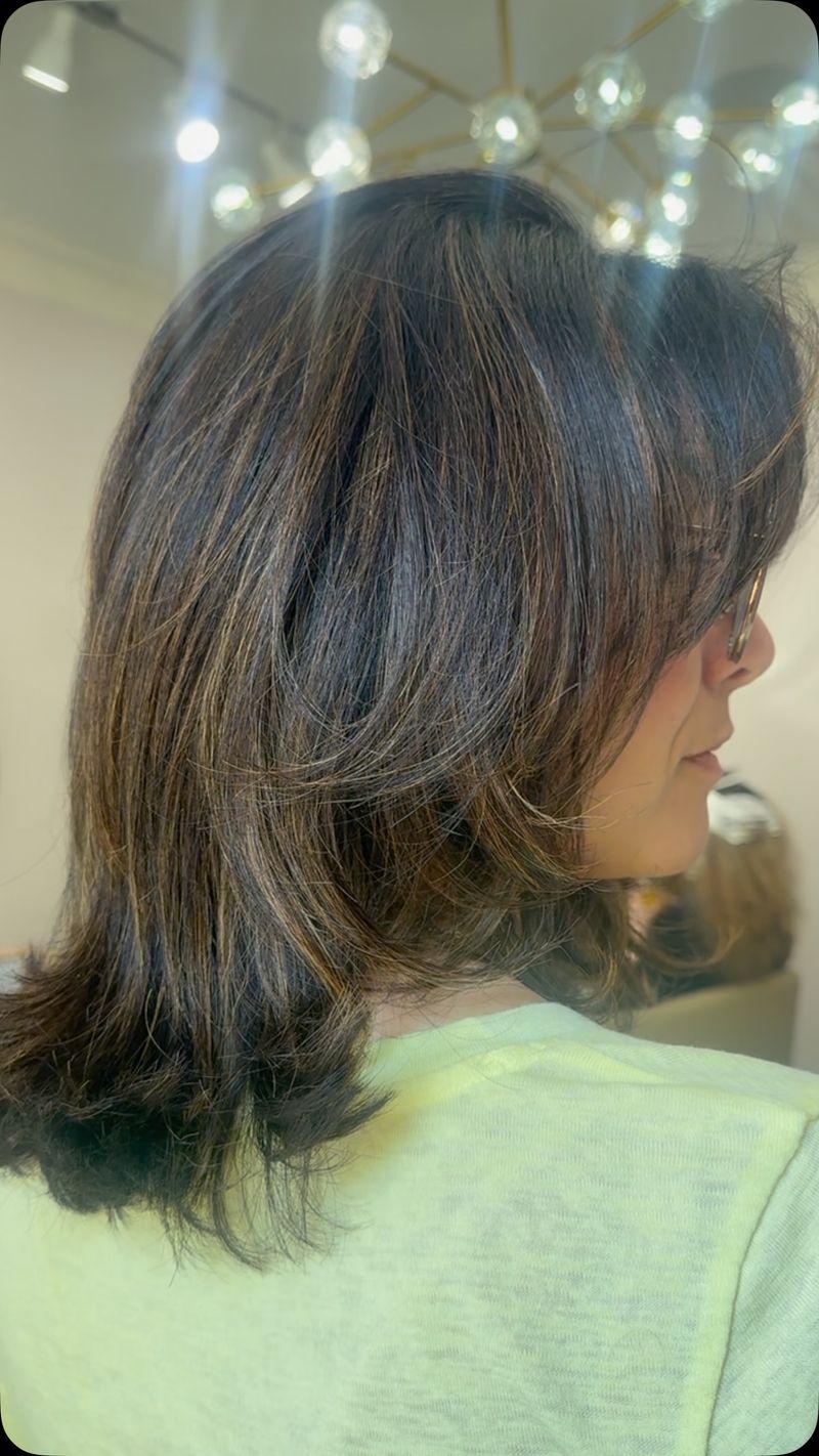 Feathered Mid-Length with Wispy Bangs