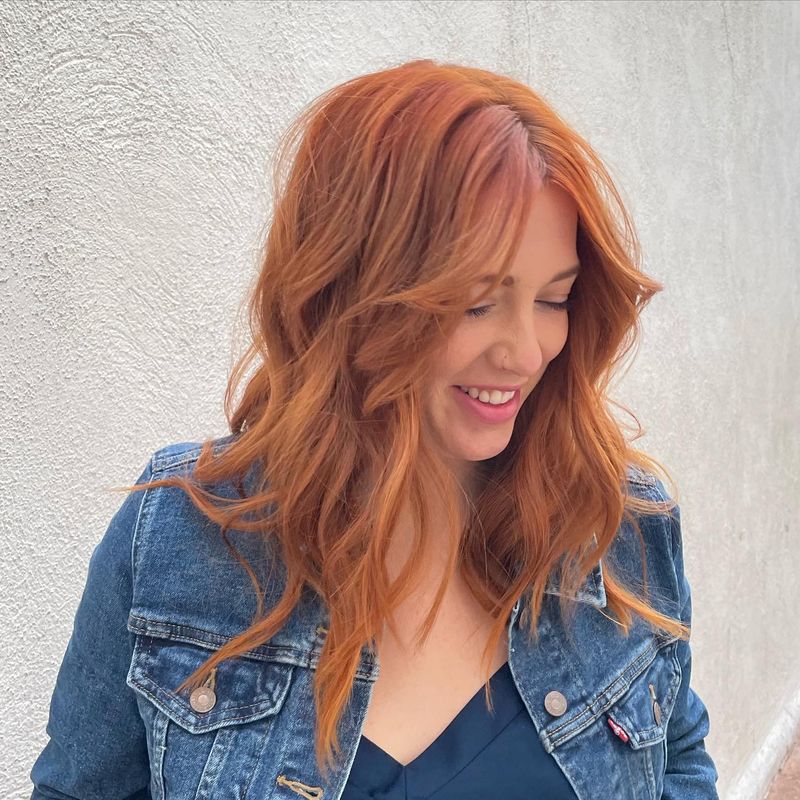 Layered Mid-Length Cut with Curtain Bangs
