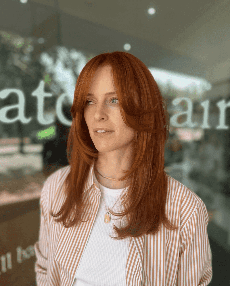 Face-Framing Layers with Long Curtain Bangs
