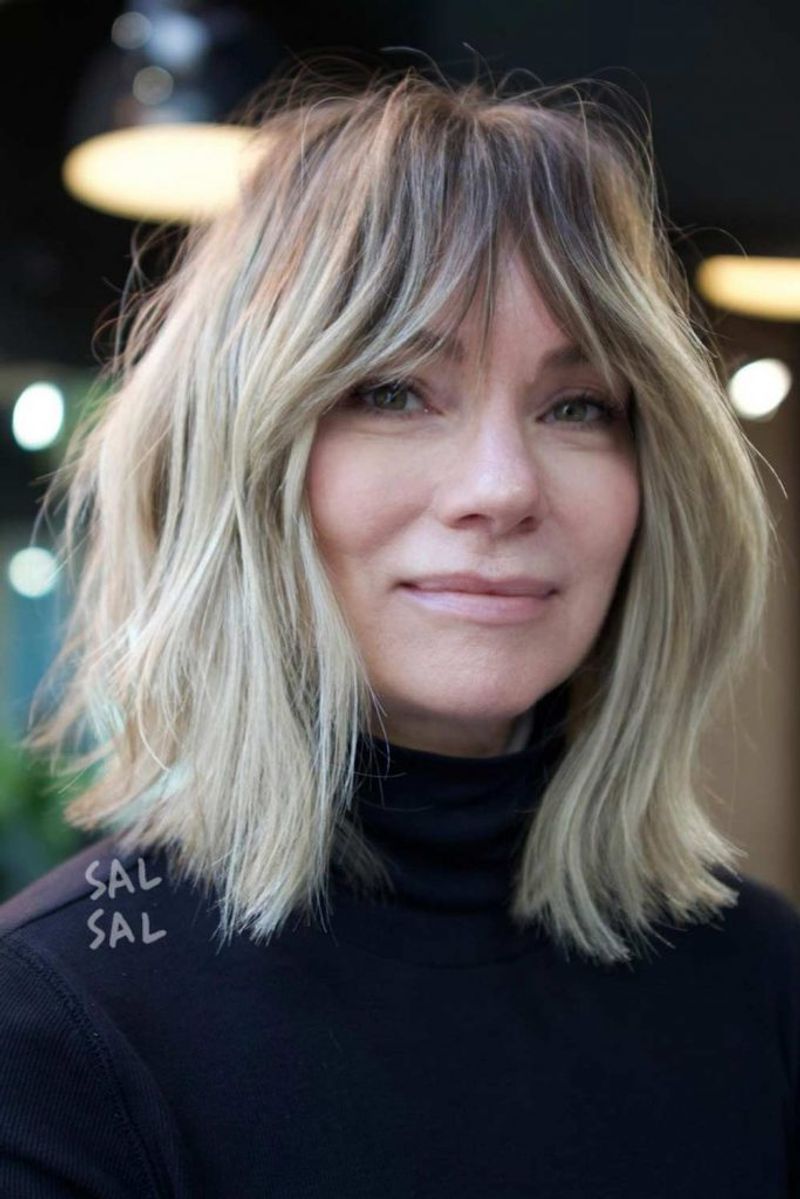 Razored Layers with Wispy Bangs