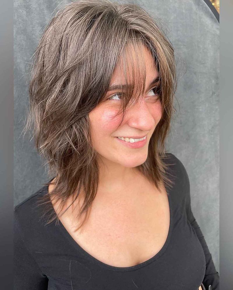 Choppy Midi with Face-Framing Layers