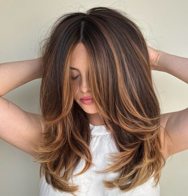 Layered Mid-Length Cut with Face-Framing