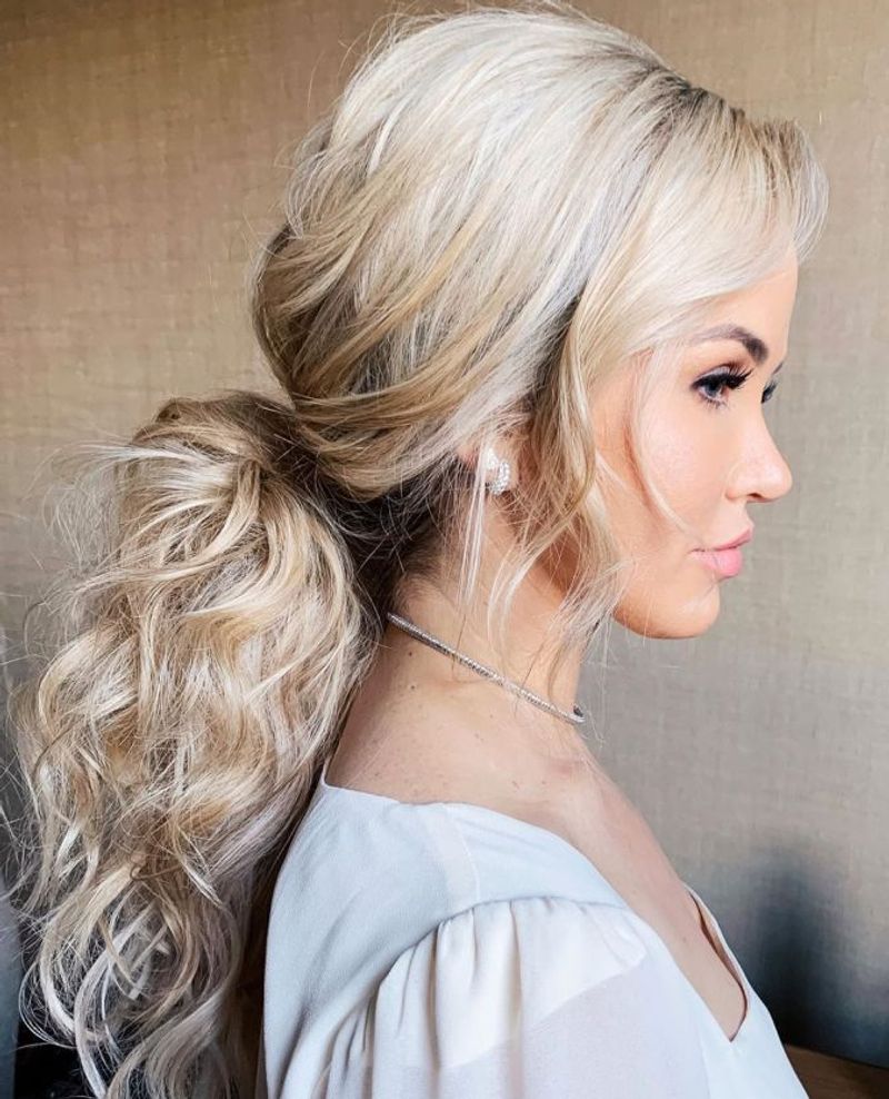 Side-Swept Wispy Ponytail