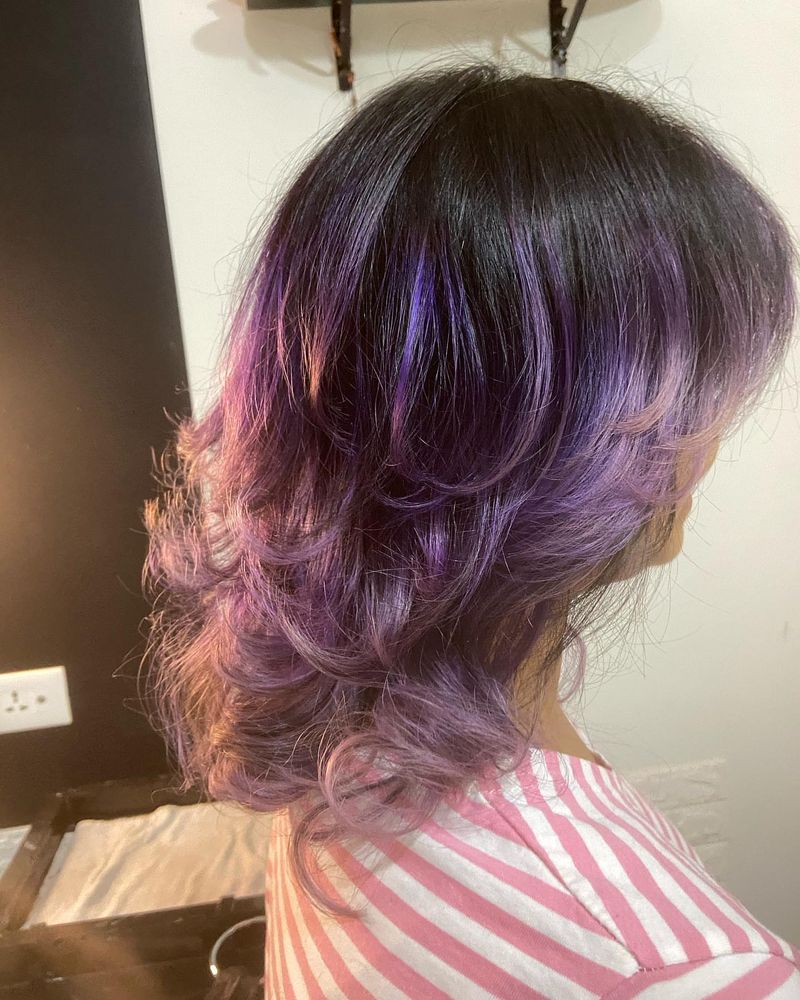 Wolf Cut With Vibrant Purple Streaks