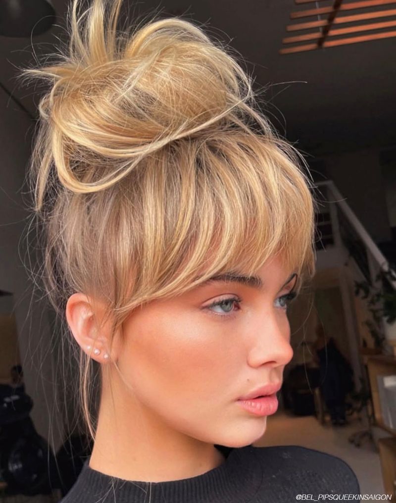 Messy Bun with Wispy Bangs