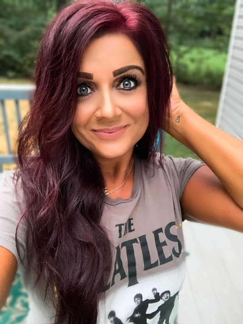 Side-Swept Bangs with Chocolate Cherry Color
