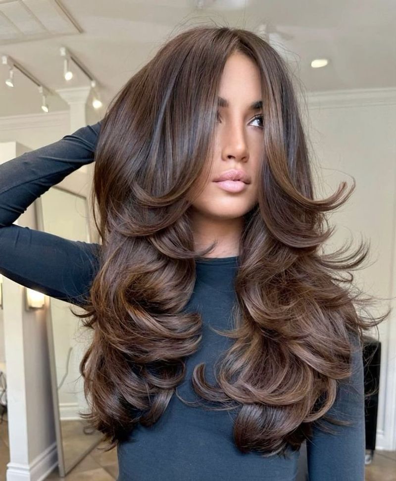 Can you show me examples of butterfly cuts on my hair type?