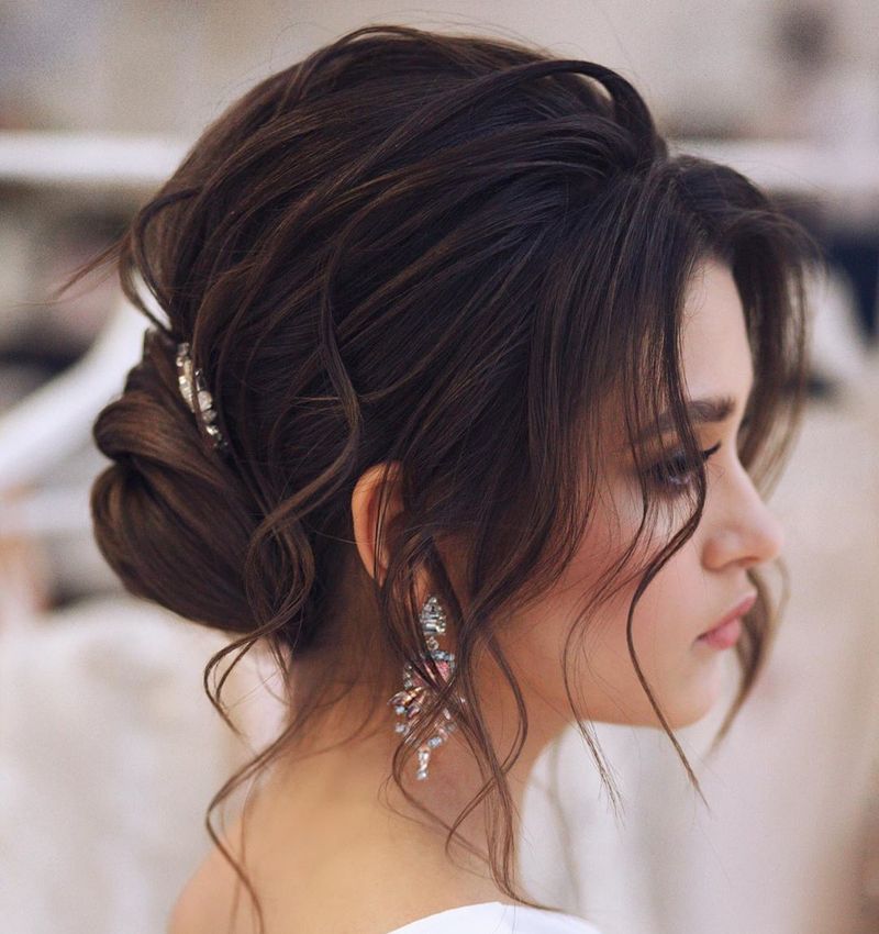 Low Looped Bun with Face-Framing Pieces