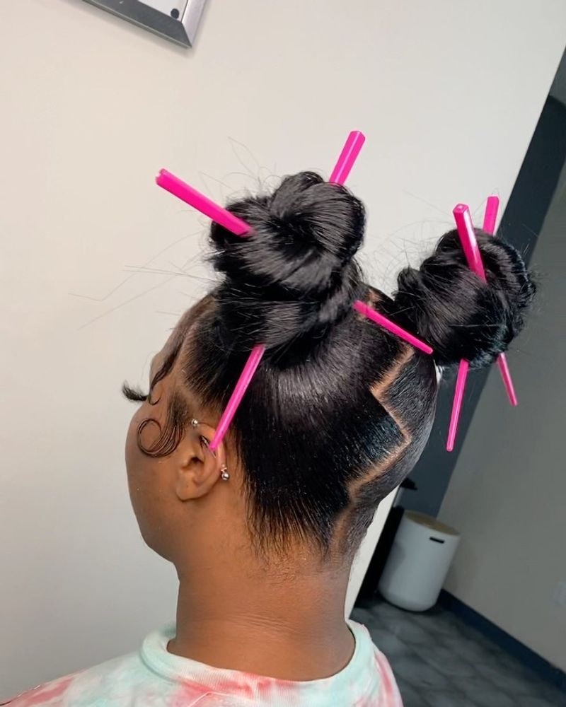 Divertimento con doppio chignon
