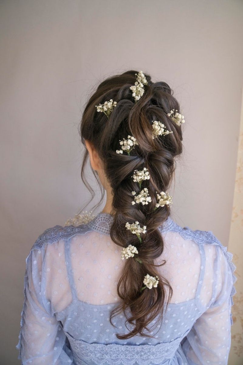 Scattered Tiny Blossoms Throughout Braids