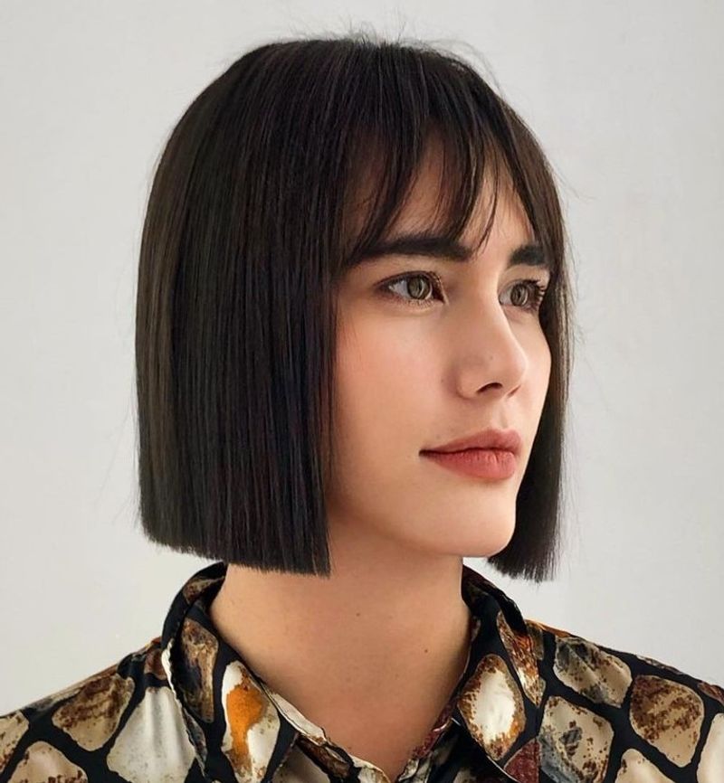 Blunt Bob with Straight Brow-Skimming Bangs