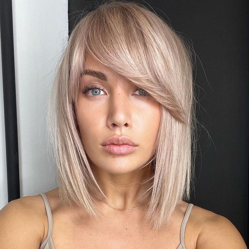 Midi Cut with Side-Swept Bangs
